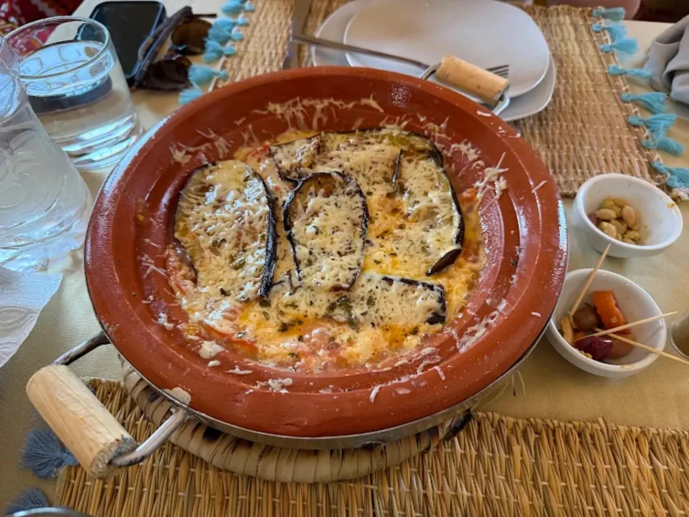 Aubergine tagine with tomato sauce and melted cheese at Restaurant Africa Merzouga