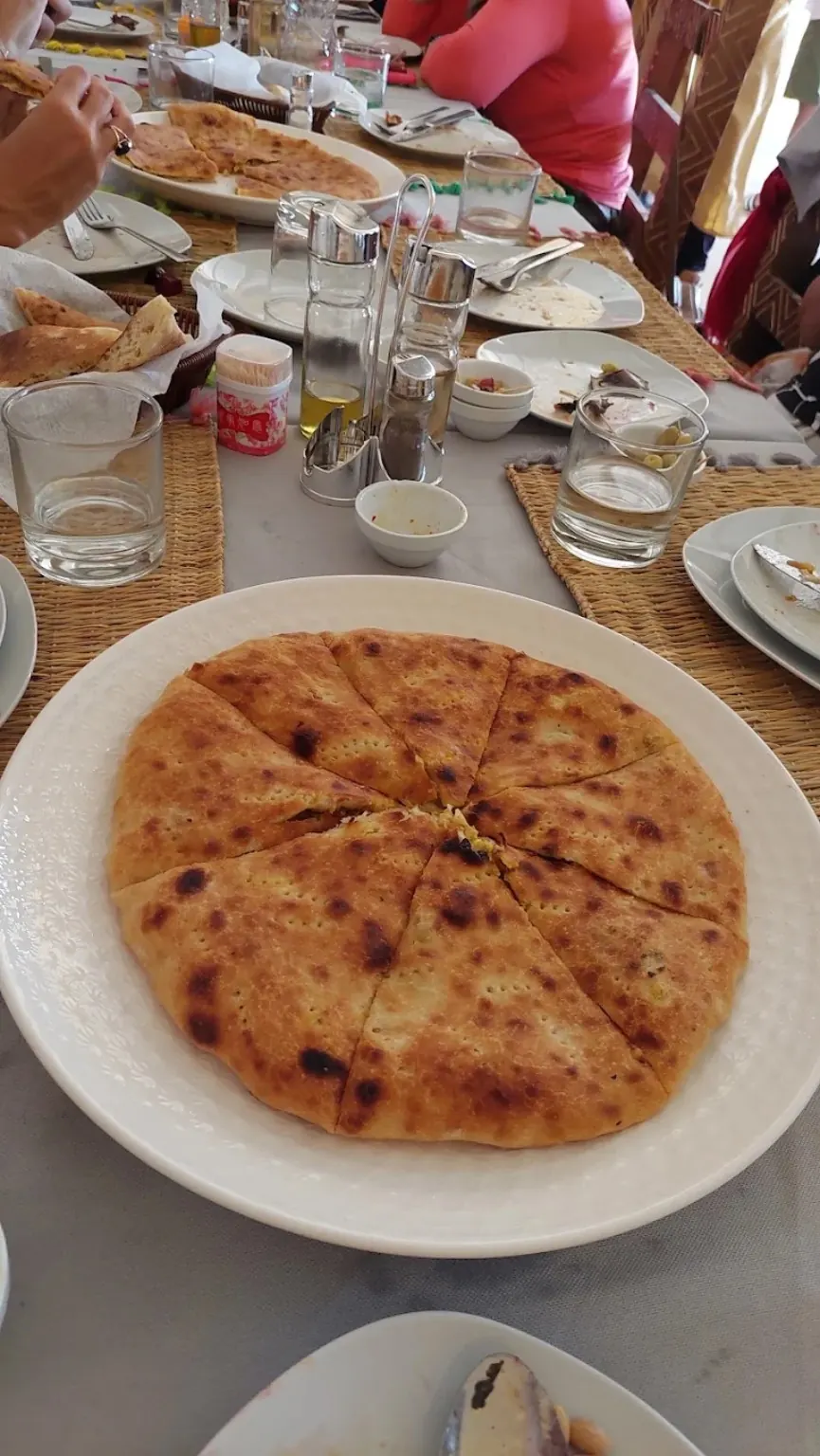 Traditional stuffed Berber pizza known as madfouna in Merzouga