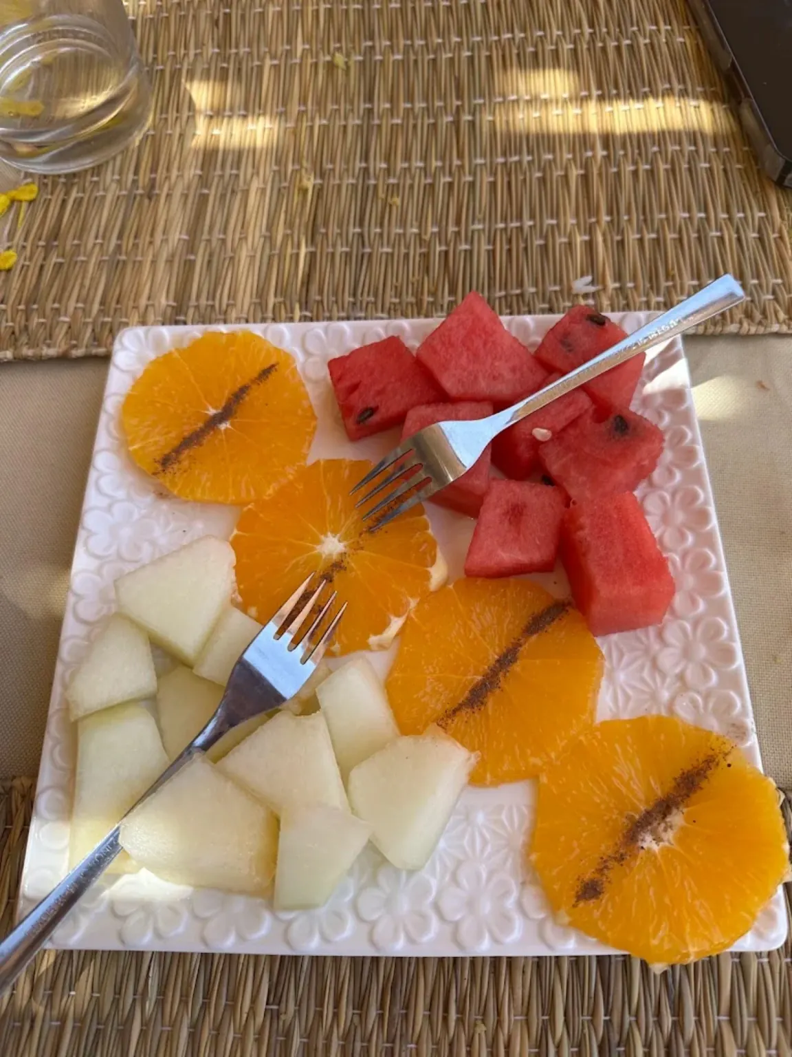 Seasonal fruit platter with watermelon melon and oranges at Restaurant Africa